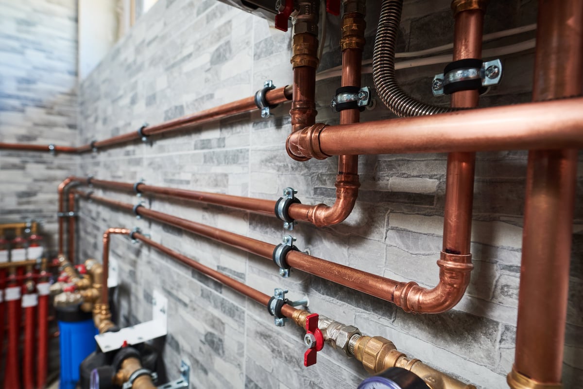 types of plumbing systems with copper pipes